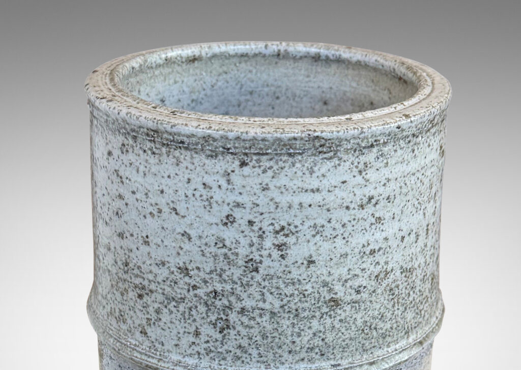 Gallery BAC cylindrical form with decorative notch detail, glazed in pale gray