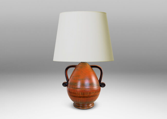 Gallery BAC upturned acorn form on a flared foot with scroll handles, glazed in brush textured orange and black