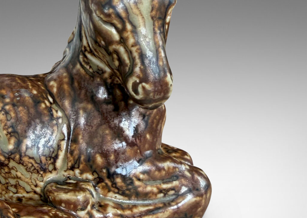 Gallery BAC Sculpture depicting a recumbent horse