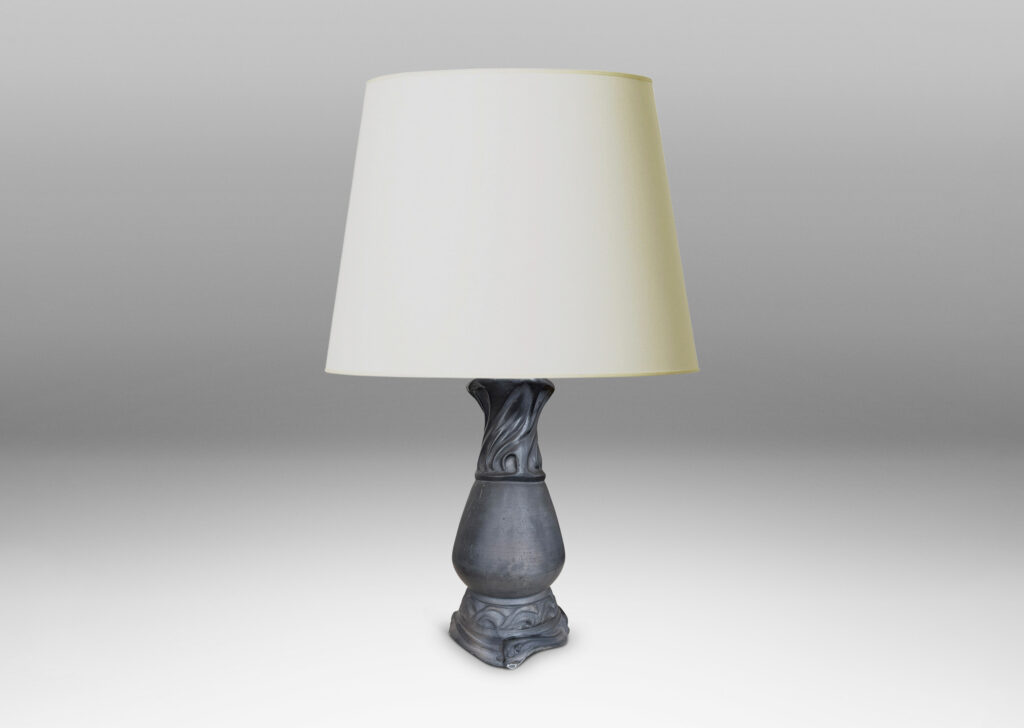 Gallery BAC swelling vase form with swirling rocaille relief base and neck in matte black