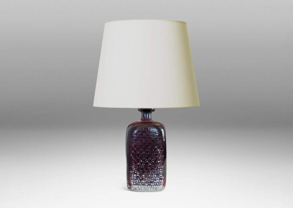 Gallery BAC tall squared bottle-like form with impressed checker circle-square pattern, glazed in flowing oxblood burgundy