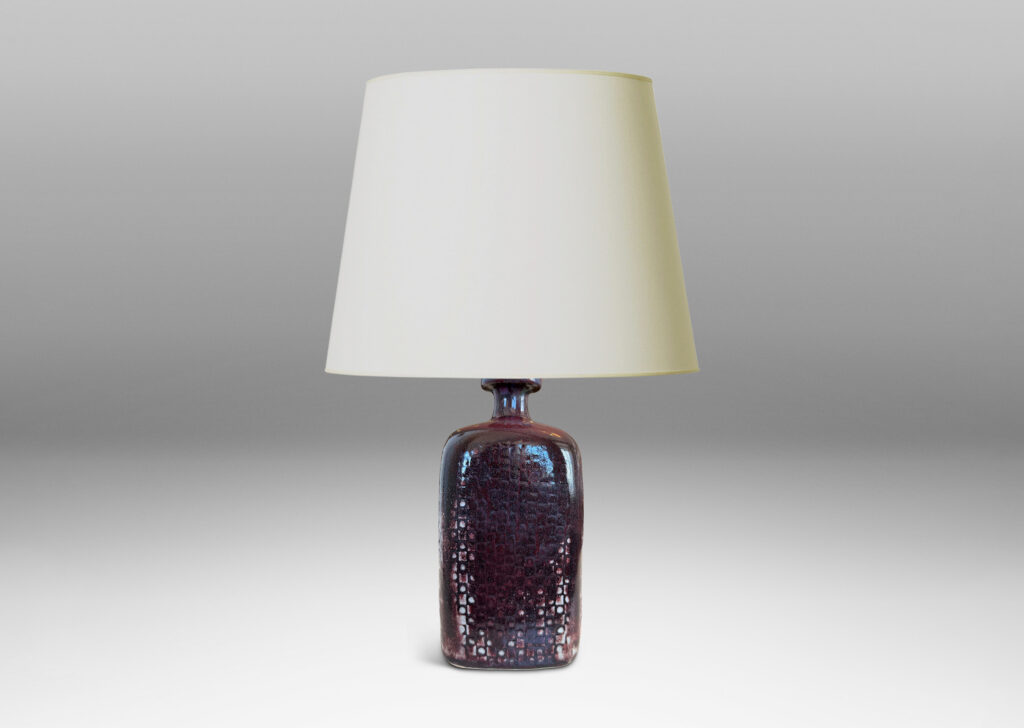 Gallery BAC tall squared bottle-like form with impressed checker circle-square pattern, glazed in flowing oxblood burgundy