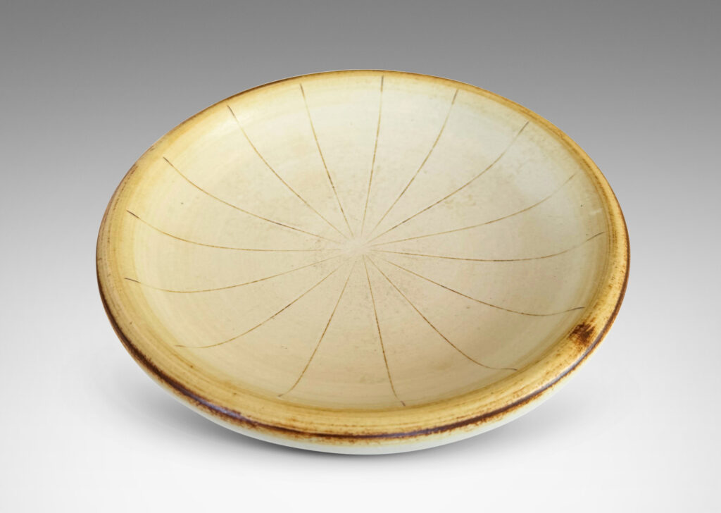 Gallery BAC soft modeling and carved radiating pinstripes, glazed in ivory with light brown accents