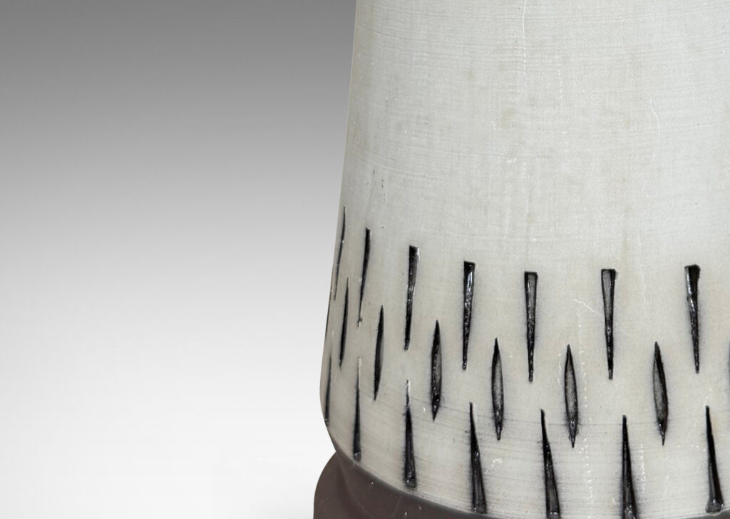 Gallery BAC raked forms with carved geometric ornaments, glazed in matte pale gray and brown