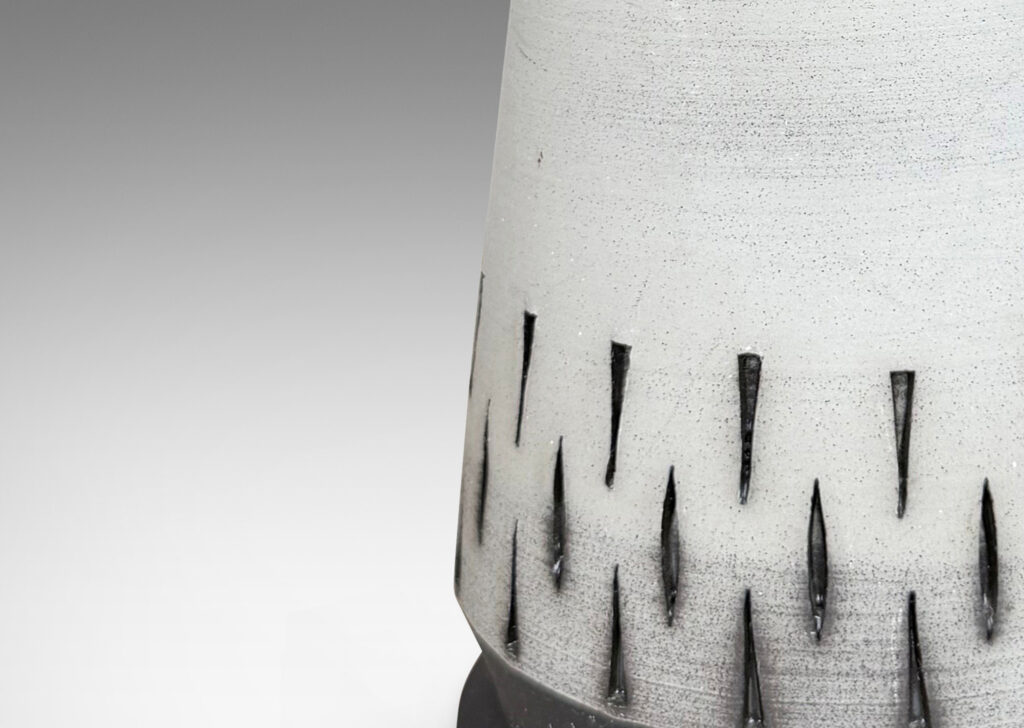 Gallery BAC raked forms with carved geometric ornaments, glazed in matte pale gray and brown
