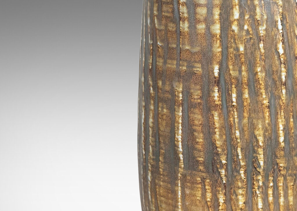 Gallery BAC large swelling cylinder forms with cuff necks, finished with a carved texture and flowing brown glaze over gray