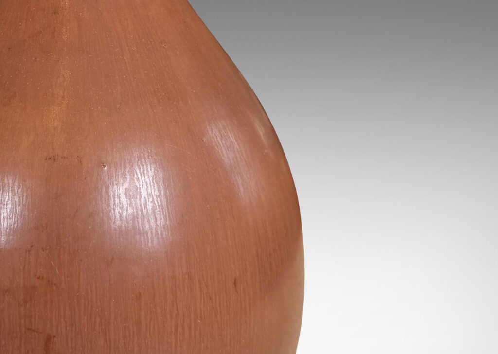 Gallery BAC swelling form with sprouting neck and flared lip, glazed in soft brown tones