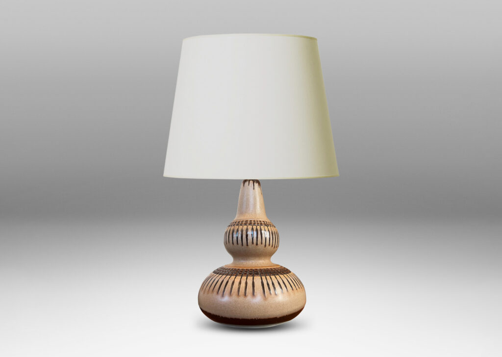 Gallery BAC double gourd form punctuated with basket-like geometric ornaments in relief, glazed in tan and brown