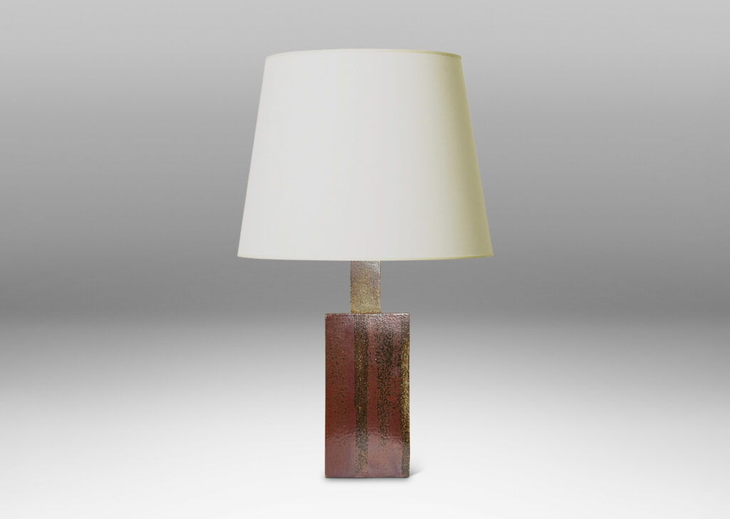 Gallery BAC two floating rectangular planes connected by a central pillar, glazed in dappled gray and red-brown