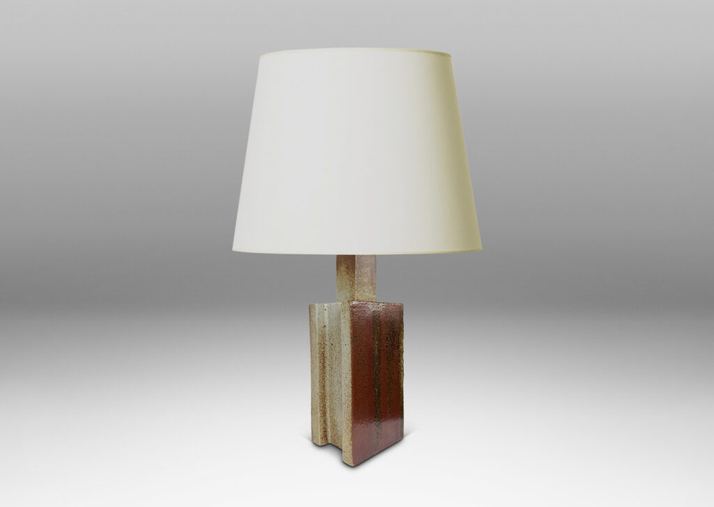Gallery BAC two floating rectangular planes connected by a central pillar, glazed in dappled gray and red-brown