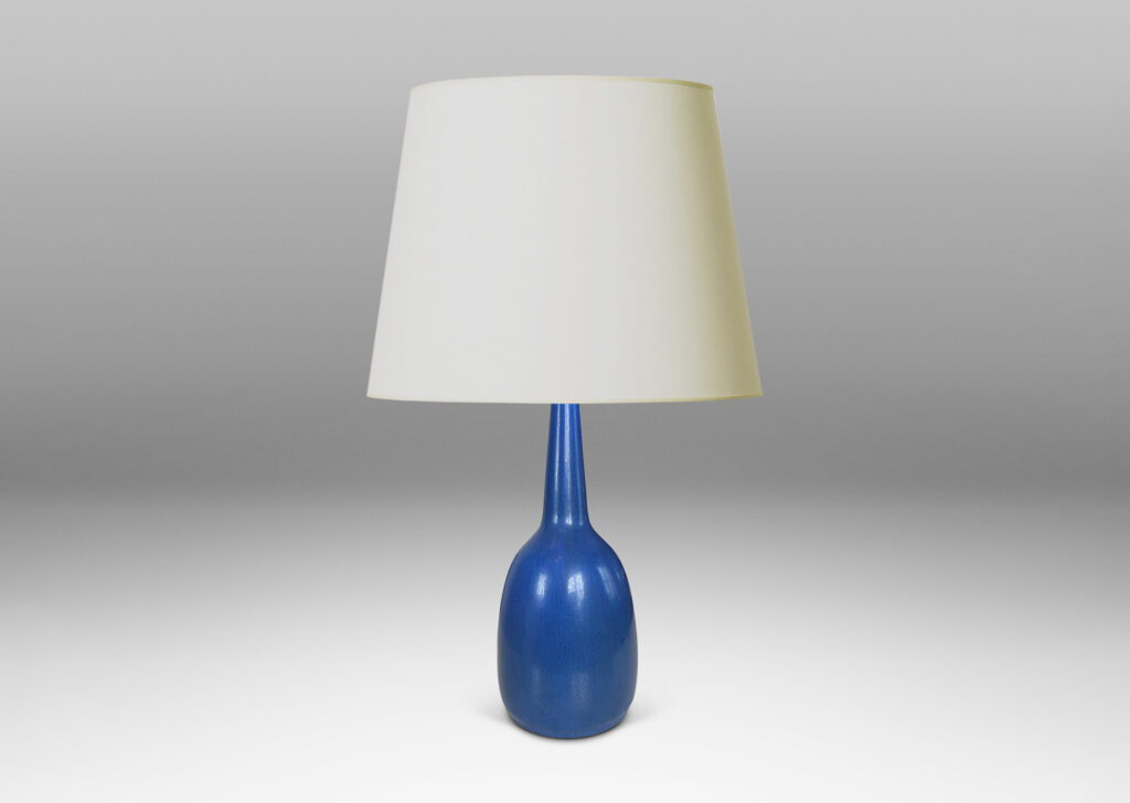Gallery BAC bulbous form with attenuated neck, glazed in a deep cornflower blue