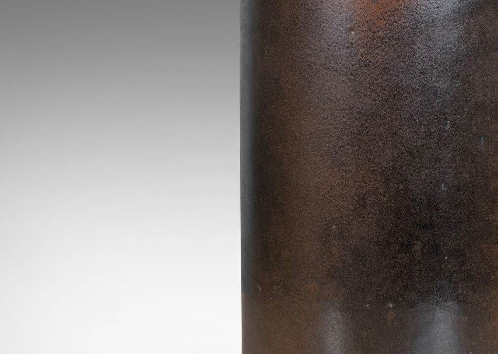 Gallery BAC large lens form with two curved side, glazed in a warm leather-like brown glaze