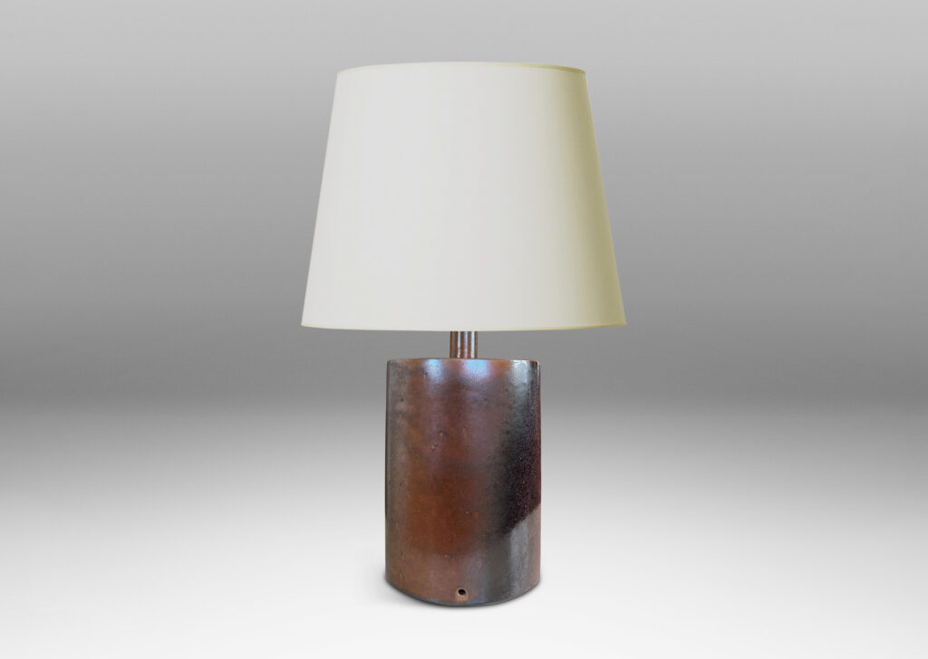 Gallery BAC large lens form with two curved side, glazed in a warm leather-like brown glaze