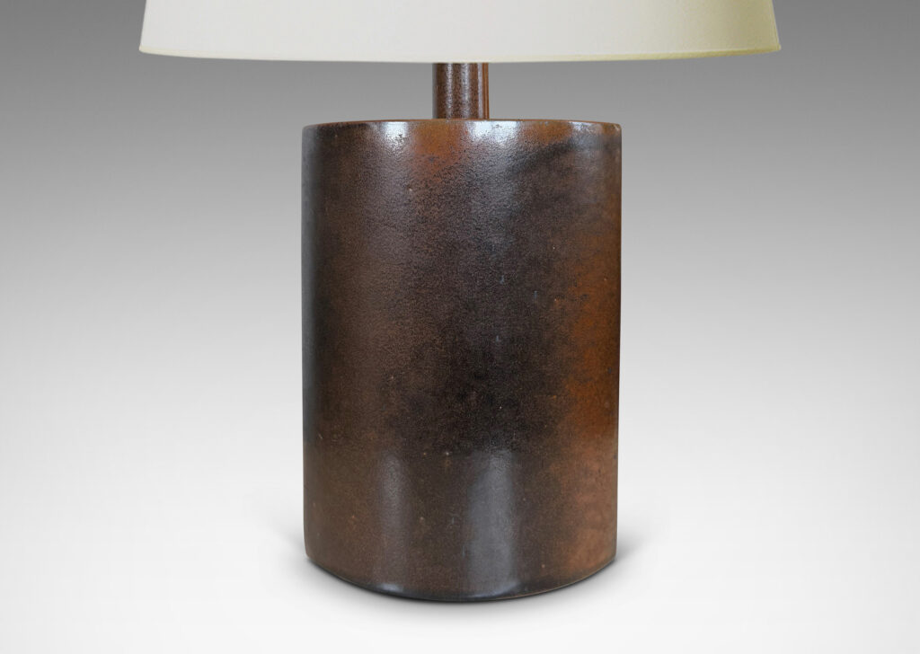 Gallery BAC large lens form with two curved side, glazed in a warm leather-like brown glaze