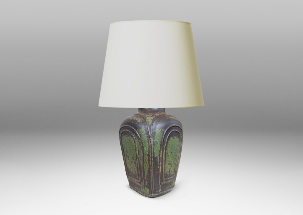 Gallery BAC four arched sides with squinched shoulders and a bottle mouth, glazed in eggshell jungle green and brown