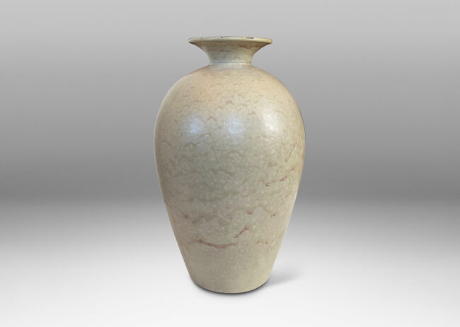 Gallery BAC tall tapered form and flared mouth, glazed in a dappled pale taupe and light beige