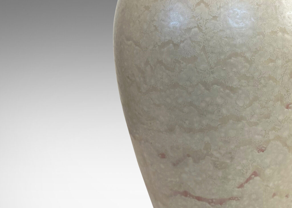 Gallery BAC tall tapered form and flared mouth, glazed in a dappled pale taupe and light beige