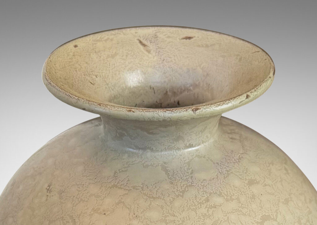 Gallery BAC tall tapered form and flared mouth, glazed in a dappled pale taupe and light beige