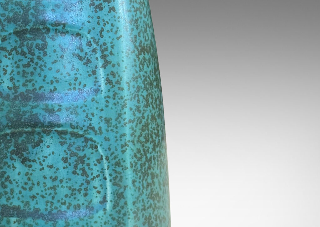 Gallery BAC conical form with two flat faces decorated with organic panels, glazed in a mottled turquoise