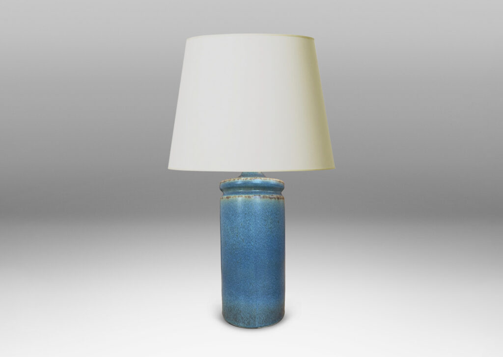 Gallery BAC cylindrical forms with exotic capped top, glazed in a soft blue with brown