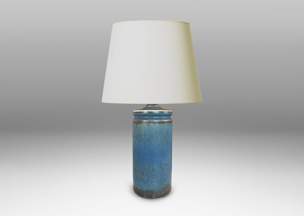 Gallery BAC cylindrical forms with exotic capped top, glazed in a soft blue with brown