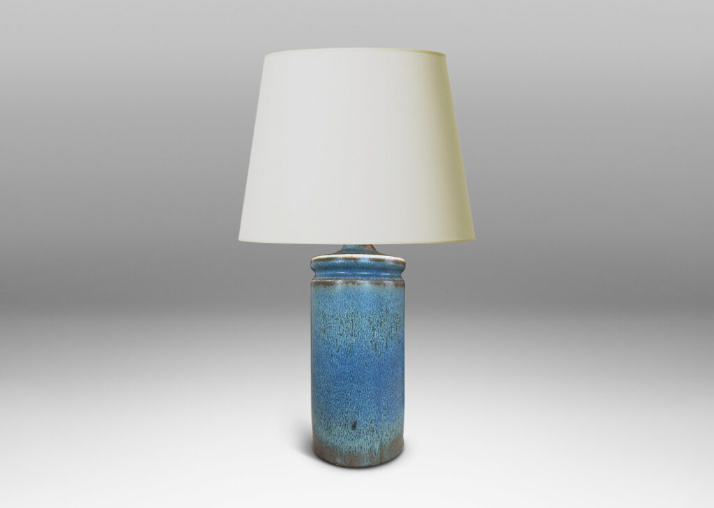 Gallery BAC cylindrical forms with exotic capped top, glazed in a soft blue with brown