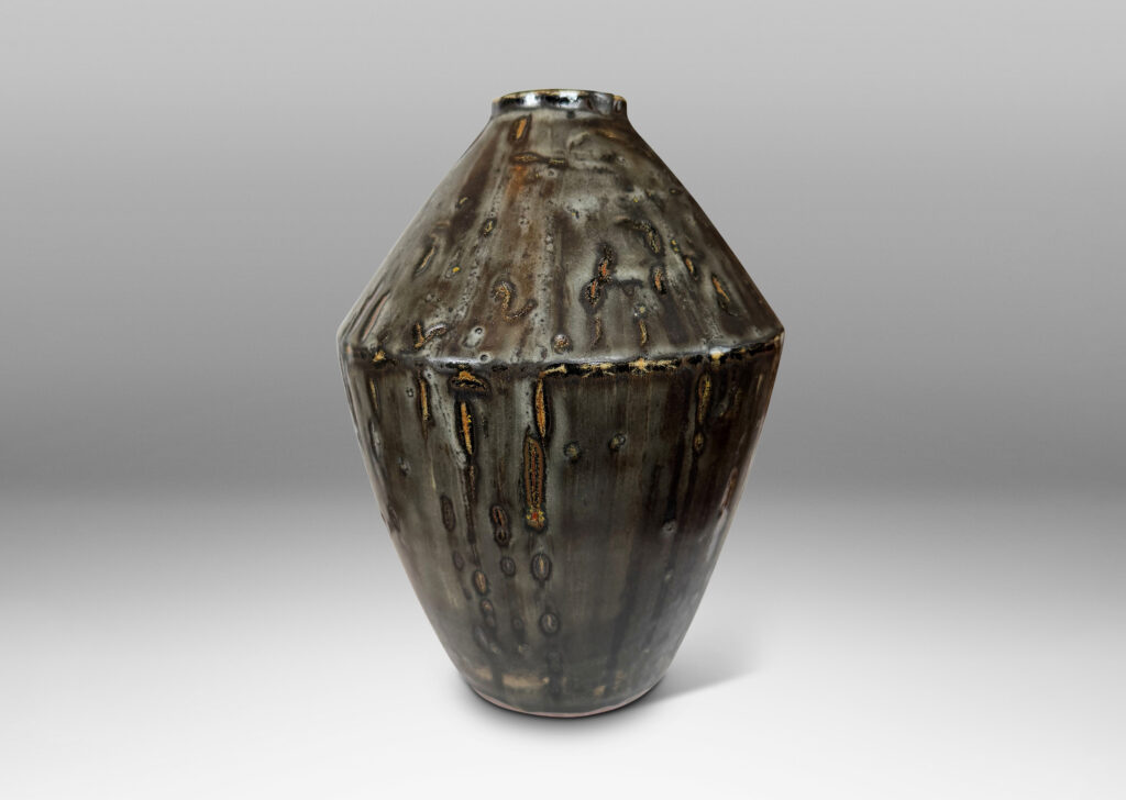 Gallery BAC angled form glazed in a thick flowing charcoal-black