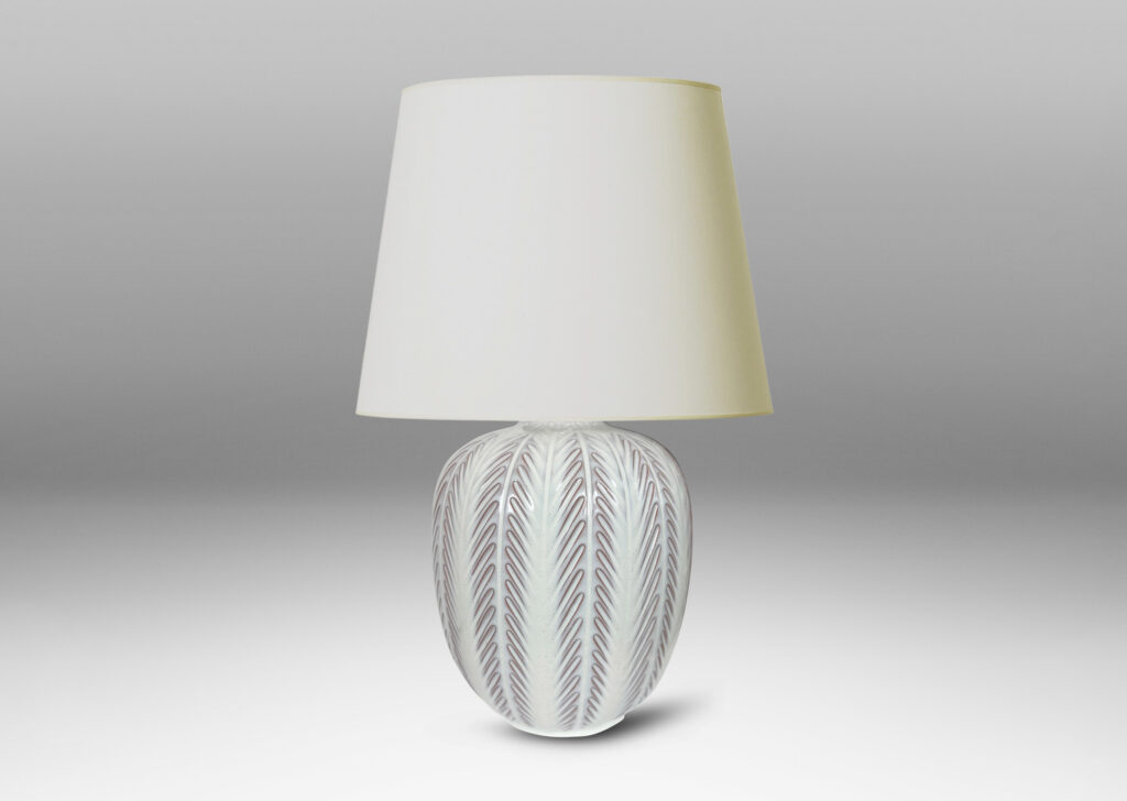 Gallery BAC ovoid form with carved foliate-like meridians, glazed in glossy white