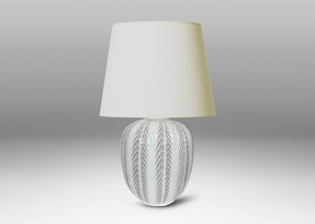 Gallery BAC ovoid form with carved foliate-like meridians, glazed in glossy white
