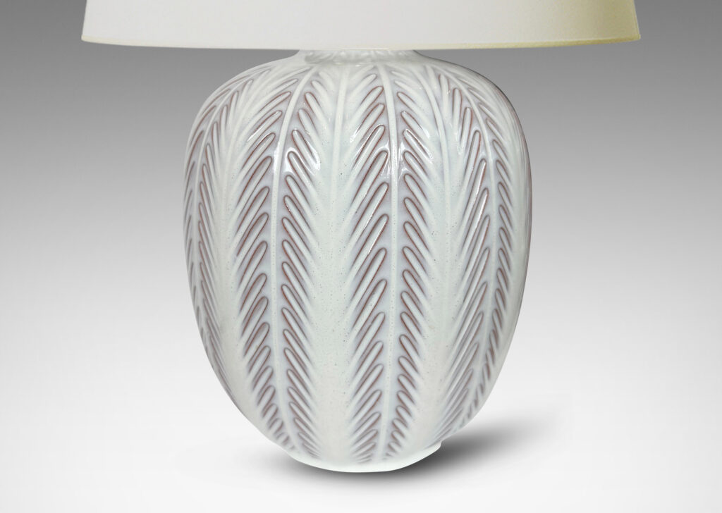 Gallery BAC ovoid form with carved foliate-like meridians, glazed in glossy white
