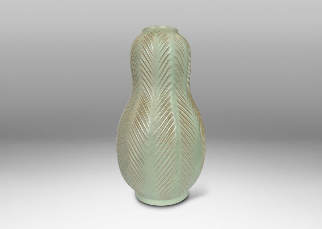 Gallery BAC double gourd form, with carved herringbone stripes, glazed in a matte subtle celadon green