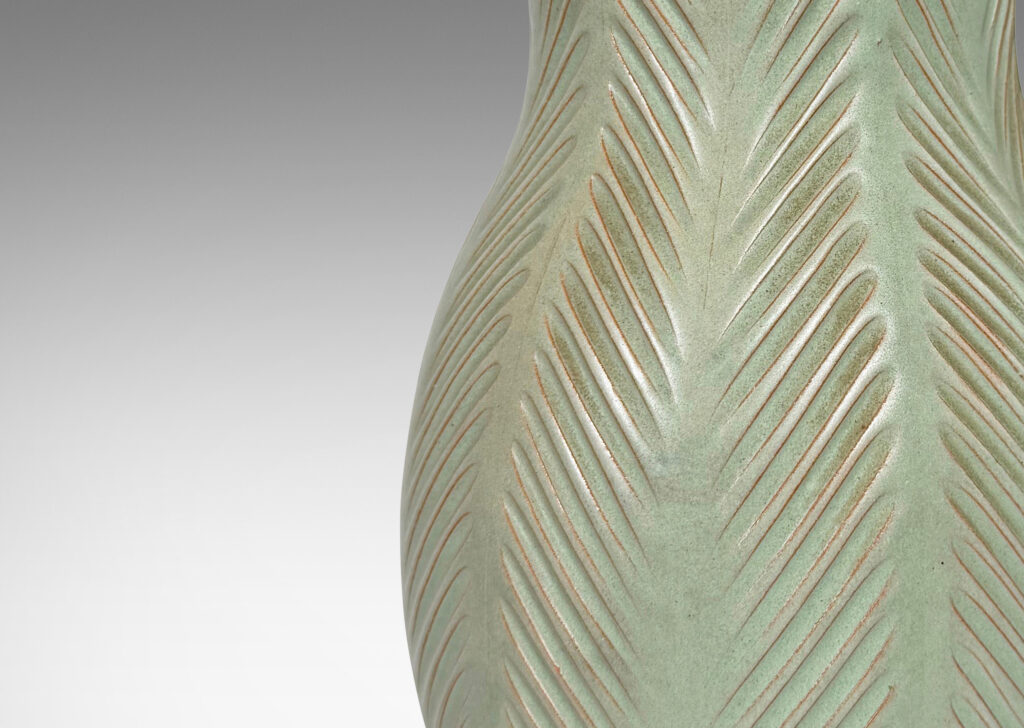 Gallery BAC double gourd form, with carved herringbone stripes, glazed in a matte subtle celadon green