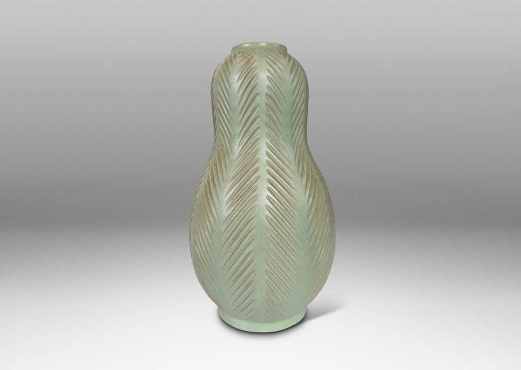 Gallery BAC double gourd form, with carved herringbone stripes, glazed in a matte subtle celadon green
