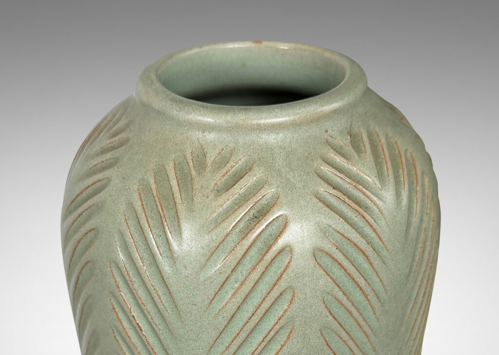 Gallery BAC double gourd form, with carved herringbone stripes, glazed in a matte subtle celadon green