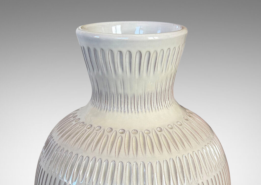 Gallery BAC classic tall tapering form with flared mouth and carved geometric ornaments