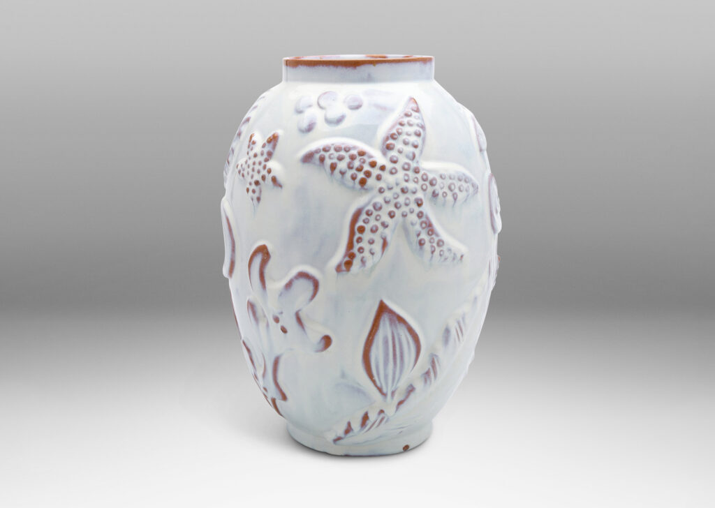 Gallery BAC ovoid form with reliefs depicting marine flora and fauna glazed in a shiny white