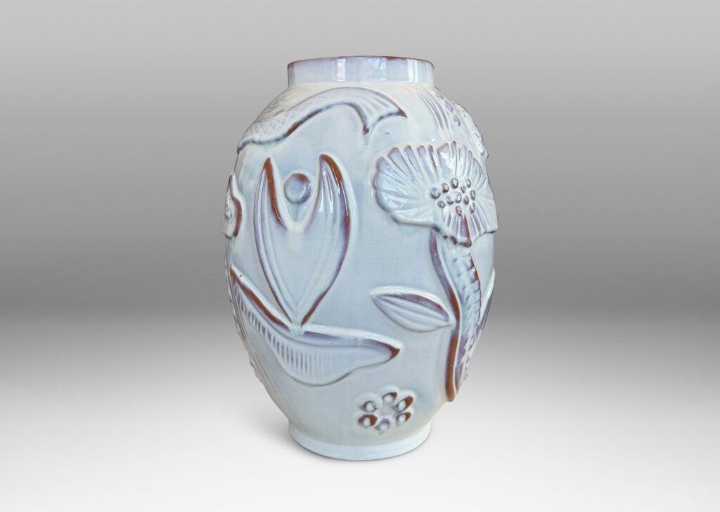 Gallery BAC ovoid form with reliefs depicting marine flora and fauna glazed in a shiny white