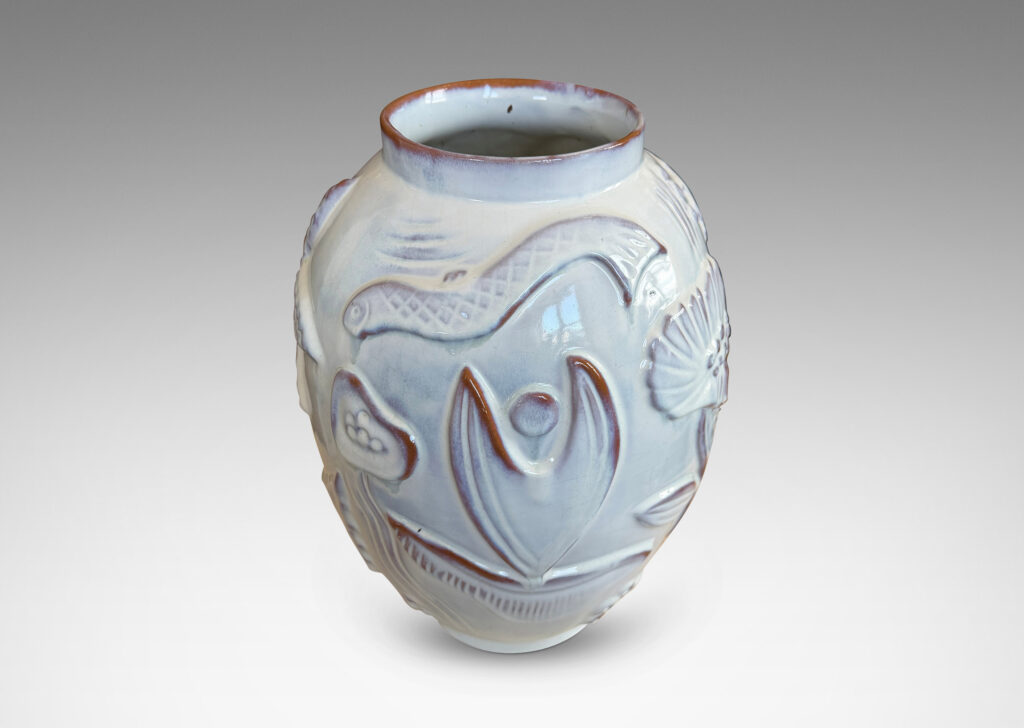 Gallery BAC ovoid form with reliefs depicting marine flora and fauna glazed in a shiny white
