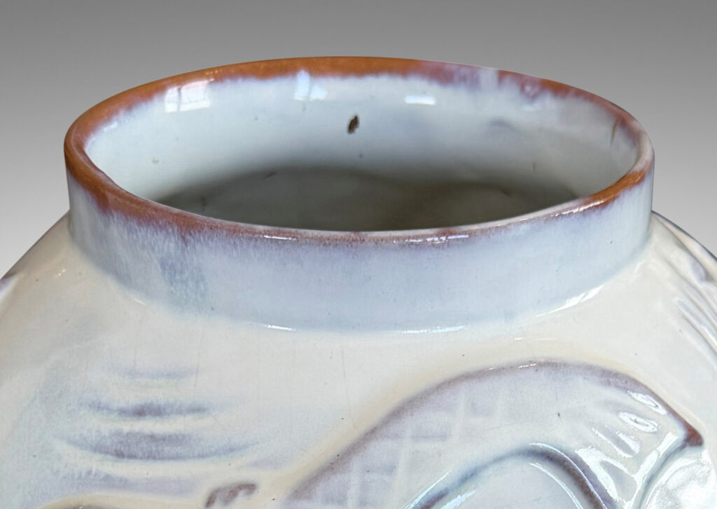 Gallery BAC ovoid form with reliefs depicting marine flora and fauna glazed in a shiny white