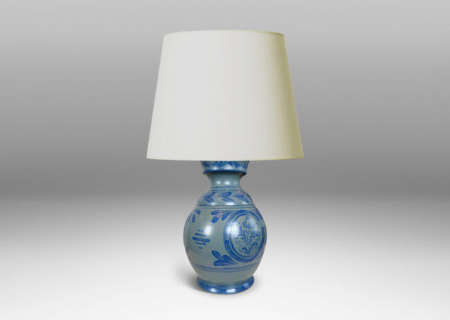 Gallery BAC plump baluster form glazed in light blue, with hand-painted blue foliate ornaments
