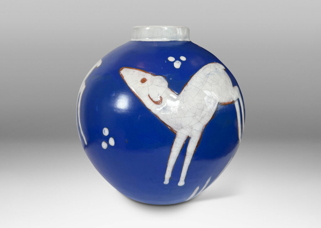 Gallery BAC globe form with cuff neck, glazed ultramarine blue with white animal figures and geometrics