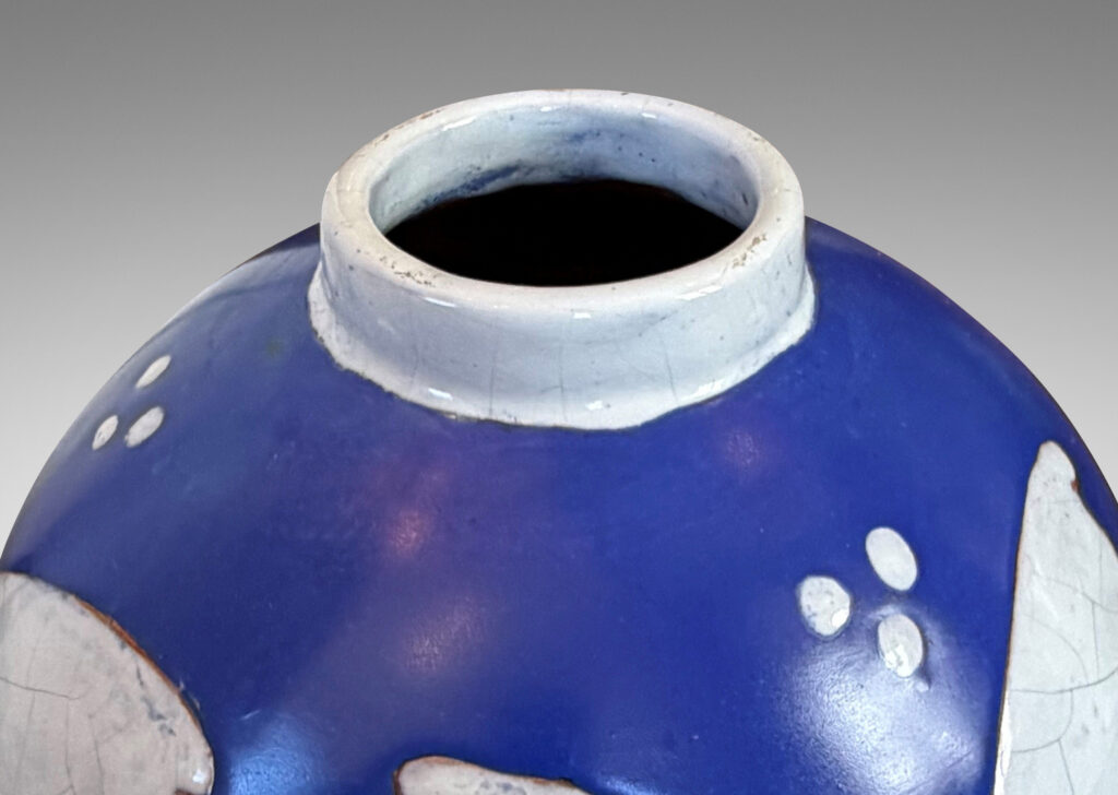 Gallery BAC globe form with cuff neck, glazed ultramarine blue with white animal figures and geometrics